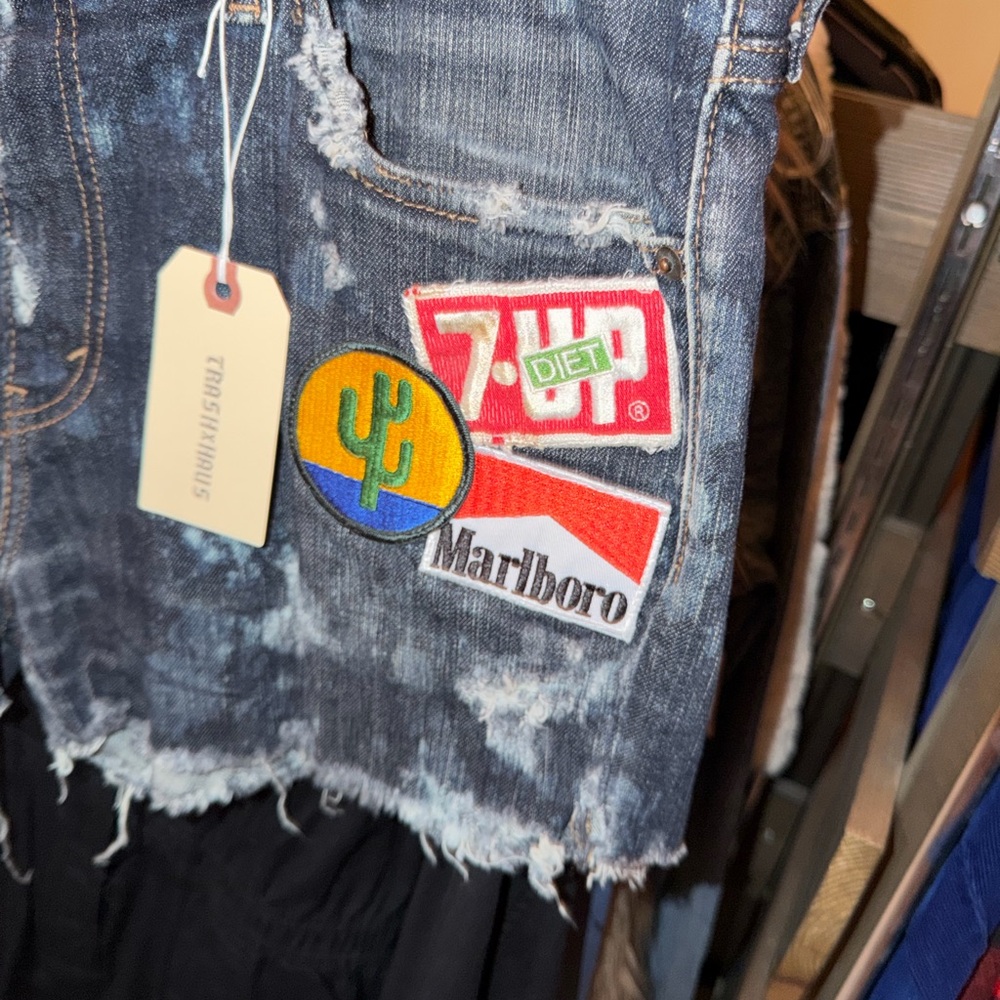 Vintage Levi’s Trashed & Patched Denim Shorts